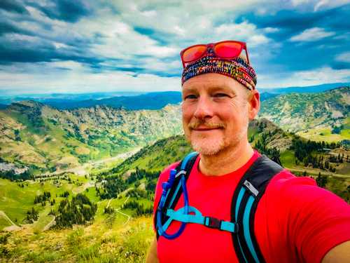 Clark Newell hiking at Alta Ski Resort